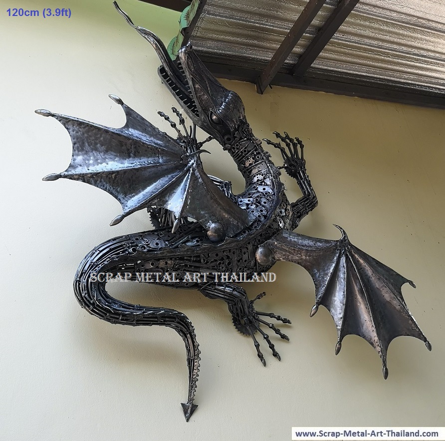 Small Dragon climbing a wall, recycled scrap metal animal art statue made in Thailand